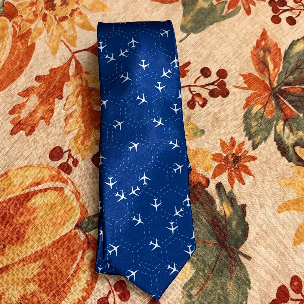 Brand new Aviation tie blue silky texture honeycomb pattern.
